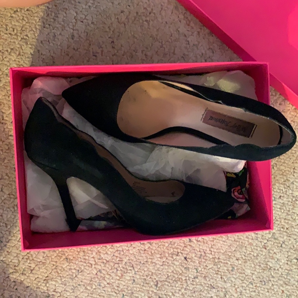 Lightly worn black heels
